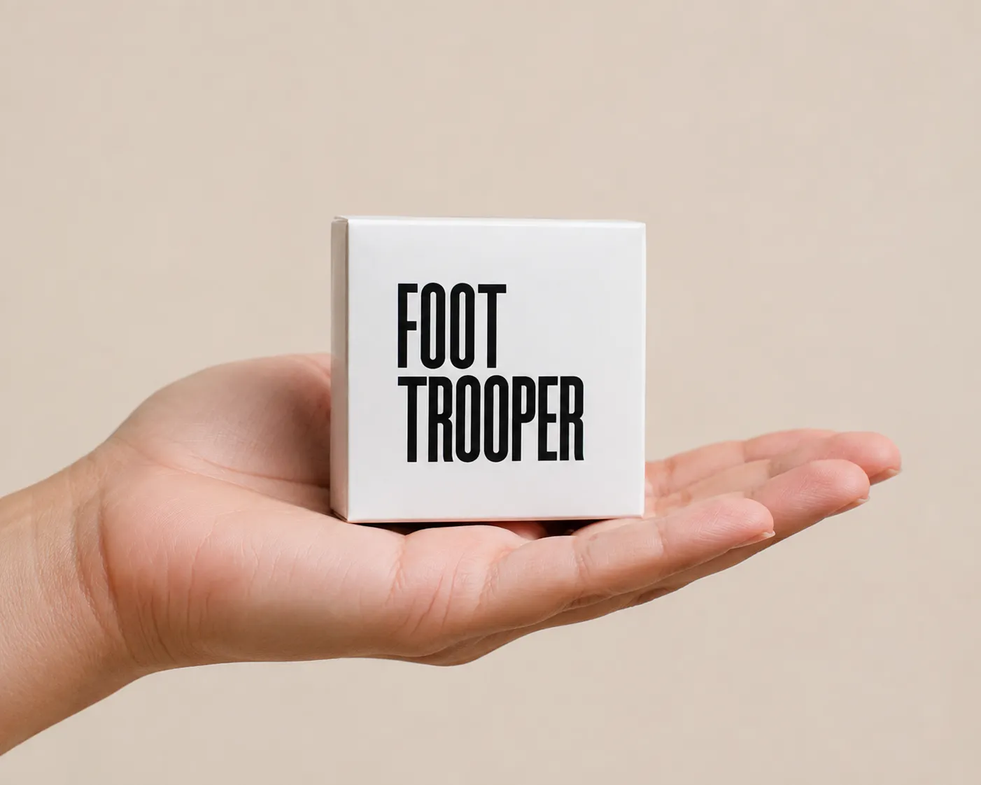 Foot Trooper — the package held in a hand