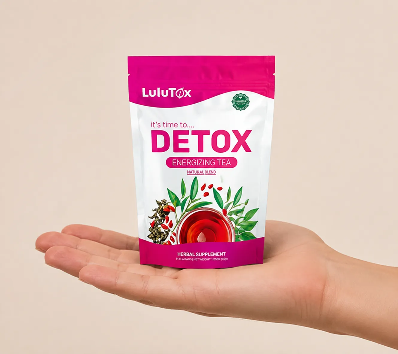 Lulutox Detox Tea — the package held in a hand